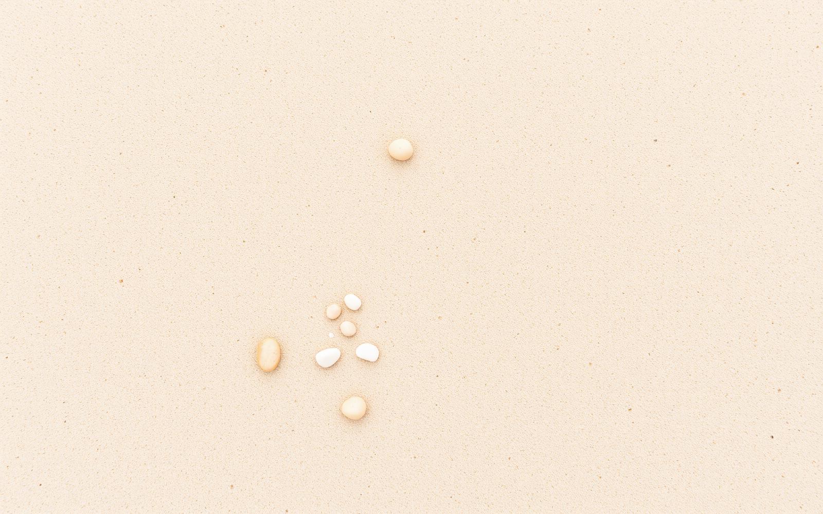 Soft sand and pebbles texture